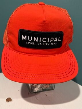 MUNICIPAL Bright Orange Trucker Hat